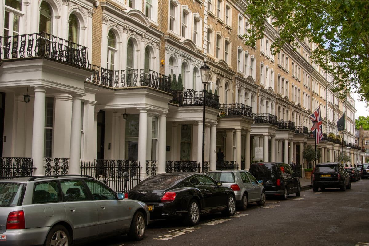 A street of grand white Georgian townhouses in London
